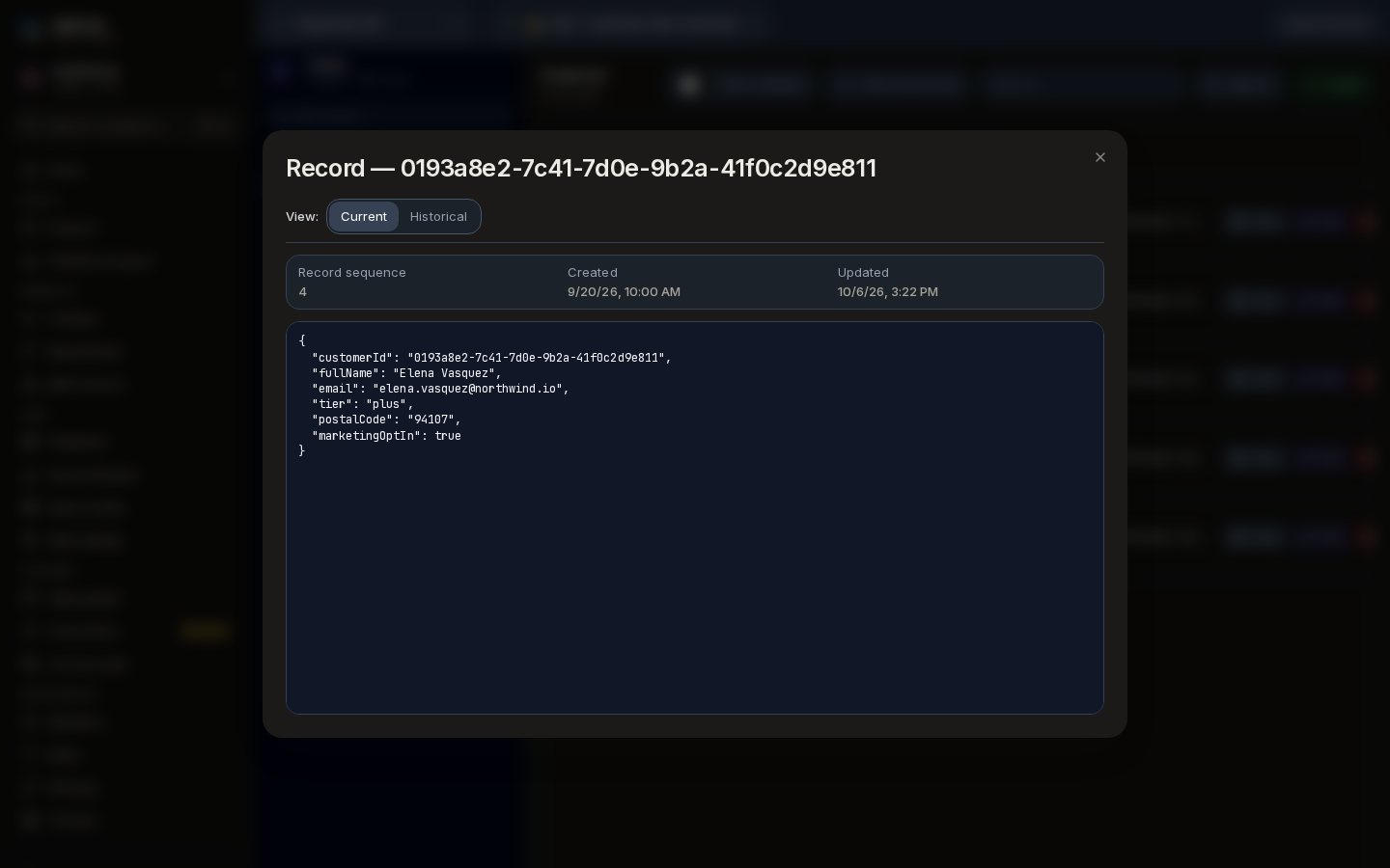A record opened: View set to Current, with record sequence 4, created and updated times, and the record's JSON